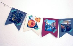DIY Fotogirlande Bild einer Wimpelkette mit Fotos
